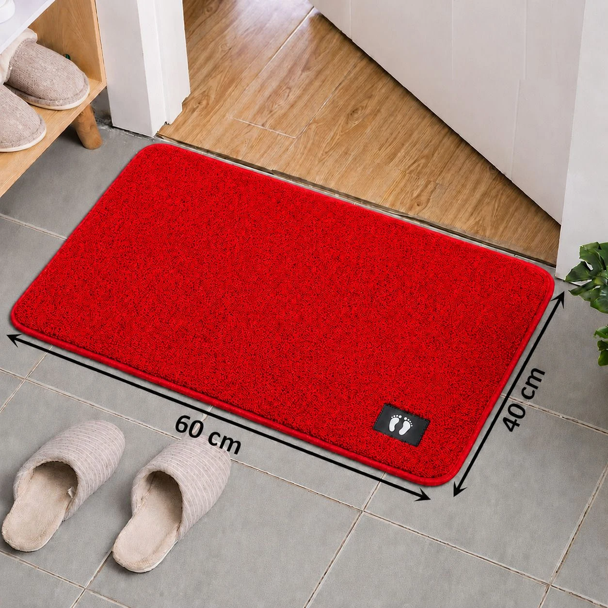 Red HOMEXCEL bath mat placed by a bathroom vanity